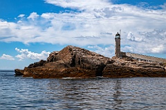 Old New Hampshire Lighthouse Sits Over Rocky Island Cliff